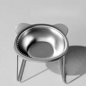 Stainless steel bowl for cats and dogs on a stand